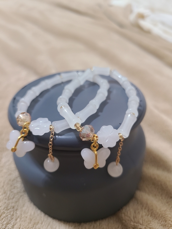 Jewelry - Glass Elegant White Beaded Butterfly Charm Bracelet with Gold Accents
